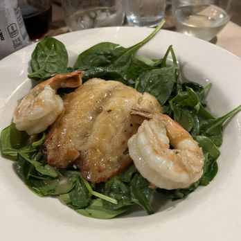 Crust Artisan Bakery - Outstanding Grouper topped with Shrimp over sauted spinach - Bakeries Near Me - Santa Rosa Beach, Florida Crust Artisan Bakery - Outstanding Grouper topped with Shrimp over sauted spinach - Bakeries Near Me - Santa Rosa Beach, Florida