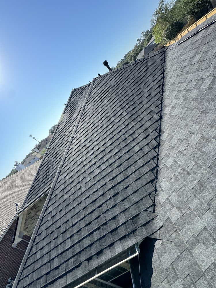 Slide of DMC Roofing