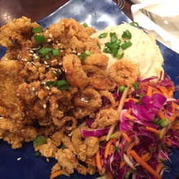 Calamari with mashed potatoes and red cabbage carrot salad - with ginger dressing. Calamari with mashed potatoes and red cabbage carrot salad - with ginger dressing.