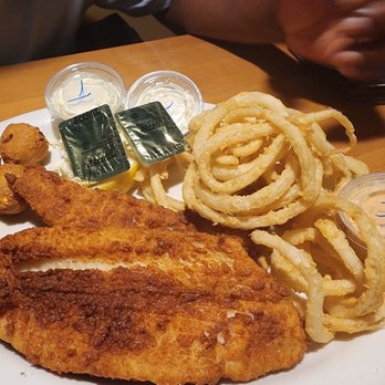 Dry Dock - Fried grouper with onion rings and hush puppies. (The Seafood Dinner) - American Near Me - Hilton Head Island, South Carolina Dry Dock - Fried grouper with onion rings and hush puppies. (The Seafood Dinner) - American Near Me - Hilton Head Island, South Carolina