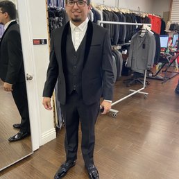 Trying it on again after alterations. Trying it on again after alterations.