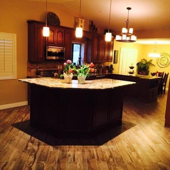 Casa Decor Tile & Stone - a kitchen with a center island - Flooring Near Me Casa Decor Tile & Stone - a kitchen with a center island - Flooring Near Me