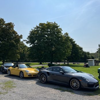 Long Cliff Vineyard & Winery - two sports cars parked in a parking lot - Wine Tours Near Me - Sanborn, New York Long Cliff Vineyard & Winery - two sports cars parked in a parking lot - Wine Tours Near Me - Sanborn, New York