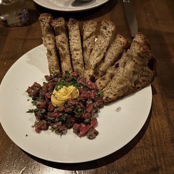 Nobie's - texas tartare:  tenderloin steak, smoked jalapeño, parsley, capers, deviled egg, toast - New American Near Me - Houston, Texas