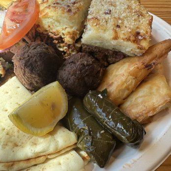 Niko Niko's - Keftedes, dolmas, spanakopita, tiropita close-up. - Greek Near Me - Houston, Texas Niko Niko's - Keftedes, dolmas, spanakopita, tiropita close-up. - Greek Near Me - Houston, Texas