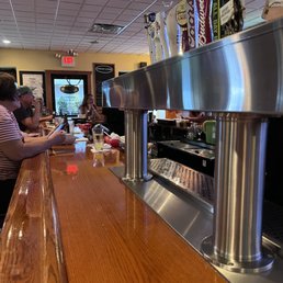 a man and a woman sitting at a bar a man and a woman sitting at a bar