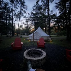 Okefenokee Pastimes Cabins & Campground - View of yurt and firepit