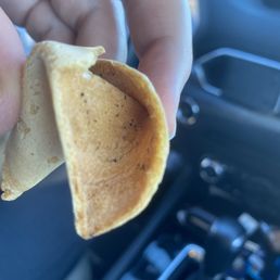 Fortune cookie covered in mold