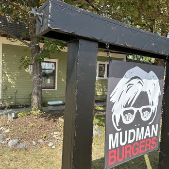Mudman Burgers - Whitefish - The sign near the restaurant located in cute house. - Burgers Near Me - Whitefish, Montana Mudman Burgers - Whitefish - The sign near the restaurant located in cute house. - Burgers Near Me - Whitefish, Montana