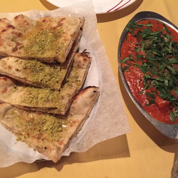 India's Restaurant - Our favorite! Chicken Tikka Masala EXTRA EXTRA SPICY. It's intense. With Kashmiri Naan. - Indian Near Me - Houston, Texas
