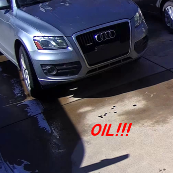 LeafFilter - Still from video of tech pulling out of my driveway. Several Oil Spots. - Gutter Services Near Me - Denver, Colorado LeafFilter - Still from video of tech pulling out of my driveway. Several Oil Spots. - Gutter Services Near Me - Denver, Colorado