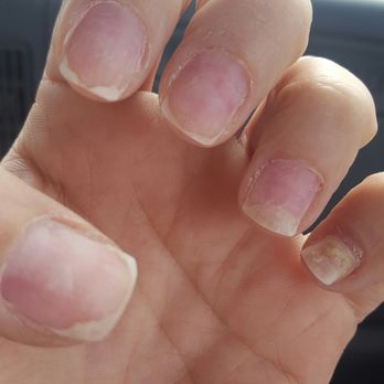 Pro Nails Salon - This is my manicurist idea of a manicure he was just about to paint them when I stopped him. - Nail Salons Near Me - Bakersfield, California