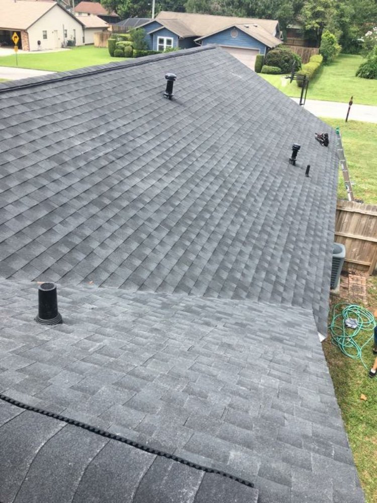 Slide of Waylon's Watertight Roofing