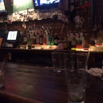 Lucky 7 - My empty glass (obviously I hated my drink. Jk jk) and a shot of the bar - Dive Bars Near Me - Jersey City, New Jersey