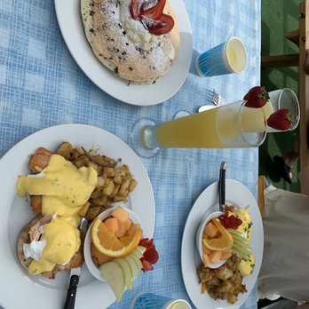 Immigrant Son Caffe - Wild salmon eggs Benedict, chocolate chip shortstack, and pineapple mimosa - New American Near Me - Ventura, California Immigrant Son Caffe - Wild salmon eggs Benedict, chocolate chip shortstack, and pineapple mimosa - New American Near Me - Ventura, California