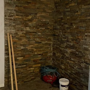 RC Roofing And Remodeling - A finished stone wall in this condo getting it ready for the owner to sell! - Painters Near Me RC Roofing And Remodeling - A finished stone wall in this condo getting it ready for the owner to sell! - Painters Near Me