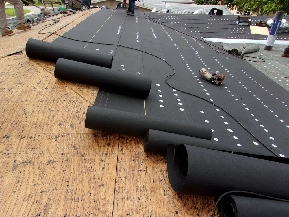 Slide of Arcon Roofing