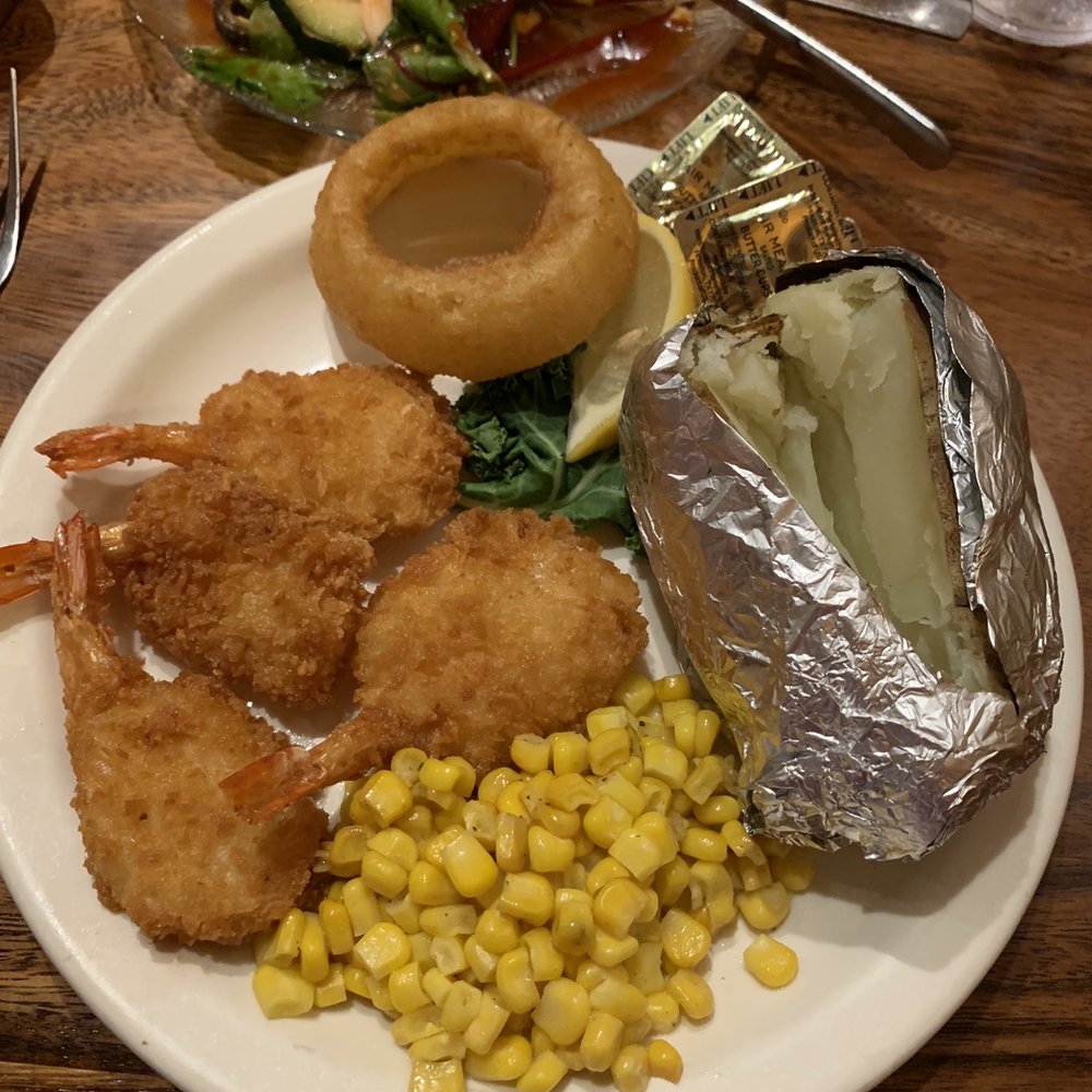 Breaded shrimp special with baked potato Breaded shrimp special with baked potato
