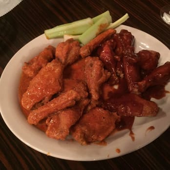 Heritage Restaurant - Extra hot wings on the left and spicy bbq on the right - American Near Me - Morgantown, Pennsylvania