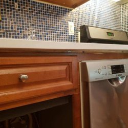 Galactic Tiles - This is how the countertop really looked.
A.K purposely had the shims ripped out.
Dishonest and Miserable person.