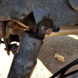 North St Paul Automotive - This is the longer stripped bolt that's supposed to go to the bottom.