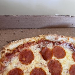 a pepperoni pizza in a box