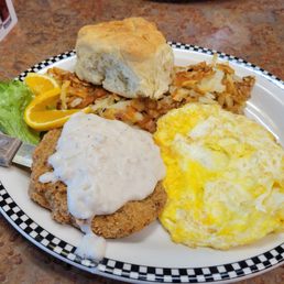 Chicken Fried Steak and Eggs with a delicious fluffy biscuit Chicken Fried Steak and Eggs with a delicious fluffy biscuit