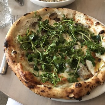 Figo - Oversized crust and extremely flimsy - cannot actually eat politely with hands. - Italian Near Me - Toronto, Ontario