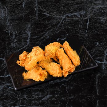 Qu Japan - fried chicken strips on a black plate - Ramen Near Me - College Park, Maryland