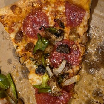 Pizza Hut - A slice of the pizza. It lacked cheese and sauce and the pizza dough was too sweet, taking away from the flavor of the other ingredients. - Pizza Near Me - Vinton, Virginia