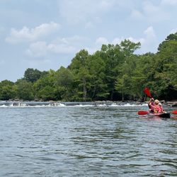 Cowboy Canoe & Kayak Rental - Tandem sit on top kayak with our dog:) Right after the waterfall