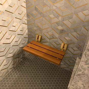 Ruben's Home Service - Wall mounted teak bench installed in a shower renovation - Electricians Near Me Ruben's Home Service - Wall mounted teak bench installed in a shower renovation - Electricians Near Me