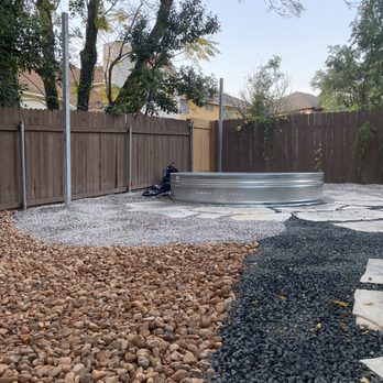 Cardenas Design and Build - Xeriscape around stock tank pool w/ metal polls for string lights & planters! - Masonry/Concrete Near Me - Spring Branch, Texas