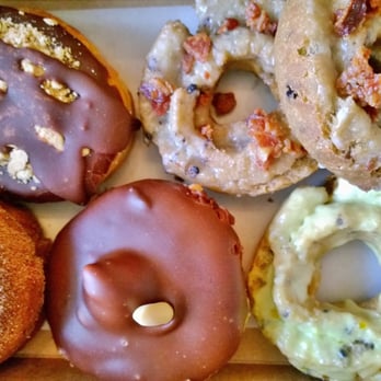 Kettle Glazed Doughnuts - Check out the blueberry maple bacon donuts in the upper right corner! - Donuts Near Me - Hollywood, California