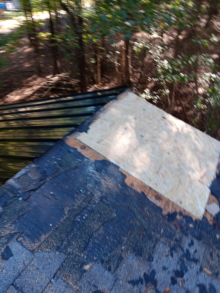 Slide of HM Bourne Roofing