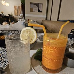 Lassan - Indian Restaurant & Bar - Caipirinha on the left Mango Lassi on the right