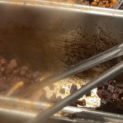 Chipotle Mexican Grill - This was the dried out beef brisket and barbacoa they were attempting to serve. Does this look fresh like they advertise?