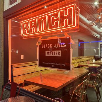 Ranch - a neon sign in the window of a restaurant - Pizza Near Me - Portland, Oregon