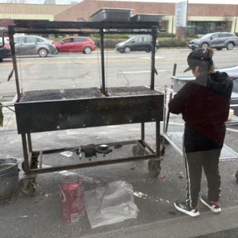 Tacos 65 - Preparing the grill - Tacos Near Me - Sacramento, California Tacos 65 - Preparing the grill - Tacos Near Me - Sacramento, California