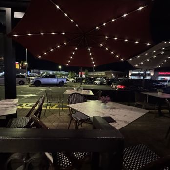 Campania Coal Fired Pizza - Lit umbrellas above patio - Bars Near Me - Staten Island, New York Campania Coal Fired Pizza - Lit umbrellas above patio - Bars Near Me - Staten Island, New York