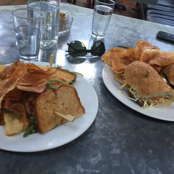 The Ice Plant - Grilled cheese and bahn Mi sandwiches at lunch with homemade chips - Cocktail Bars Near Me - St. Augustine, Florida The Ice Plant - Grilled cheese and bahn Mi sandwiches at lunch with homemade chips - Cocktail Bars Near Me - St. Augustine, Florida