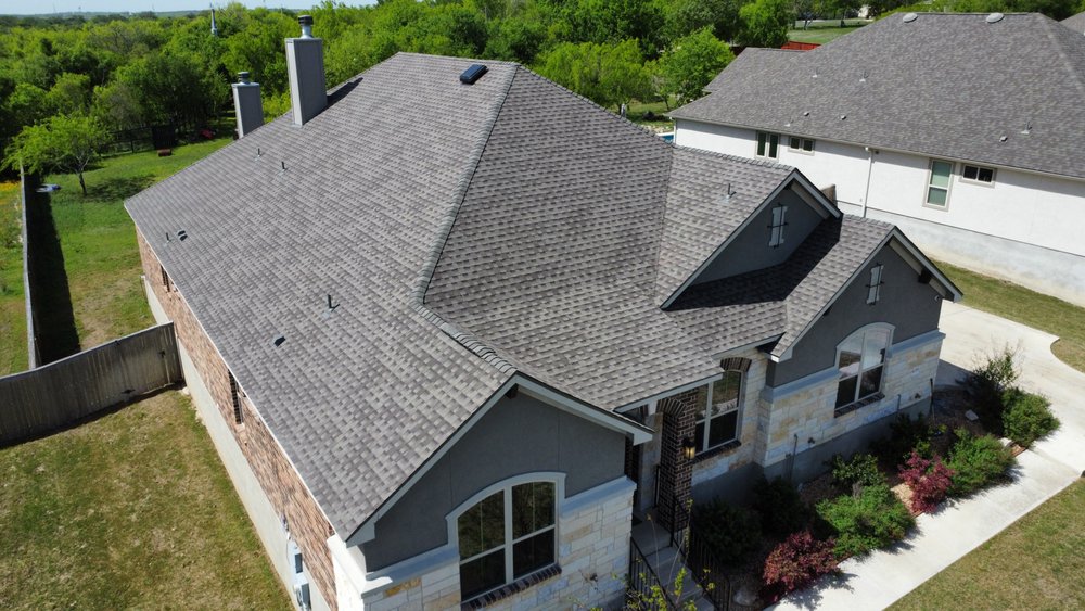 Slide of Magnum Roofing & Restoration