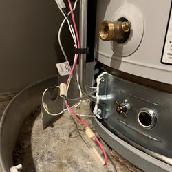 Grade A Plumbing - Matt at Grade A Plumbing bypassed the thermal switch with a paper clip and then refused to replace it and left it this way.