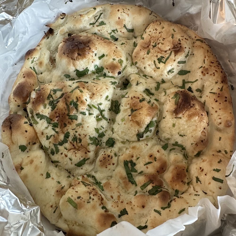 Naan -N- Curry - Garlic naan ($2.99) - Indian Near Me - Renton, Washington Naan -N- Curry - Garlic naan ($2.99) - Indian Near Me - Renton, Washington