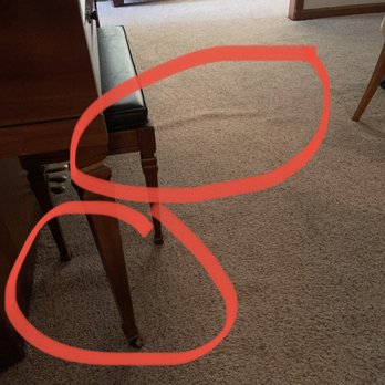 Tish Flooring - a living room with a piano - Carpeting Near Me - Indianapolis, Indiana