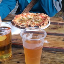The seating area, cider, and food trucks are all great amenities at The Apple.