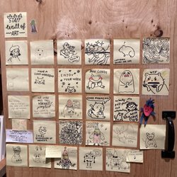 Librairie Drawn & Quarterly - Wall of staff art! (I would love to see a rack of zines/comics/merch made by the staff. This stuff is great and I'd buy it.)