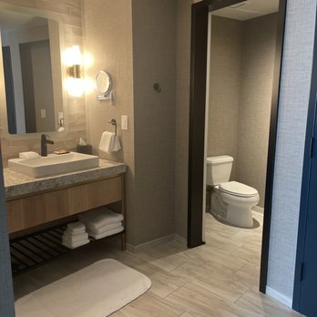 The Otis Hotel Austin, Autograph Collection - Restroom as you walk in the bedroom door - Hotels Near Me - Austin, Texas The Otis Hotel Austin, Autograph Collection - Restroom as you walk in the bedroom door - Hotels Near Me - Austin, Texas