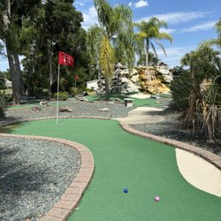 Tree Top Golf Development & Practice Center - Immaculate course with palms and music make this a very enjoyable experience.