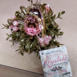 Burkes Outlet - It's a birdie on a mistletoe nest
